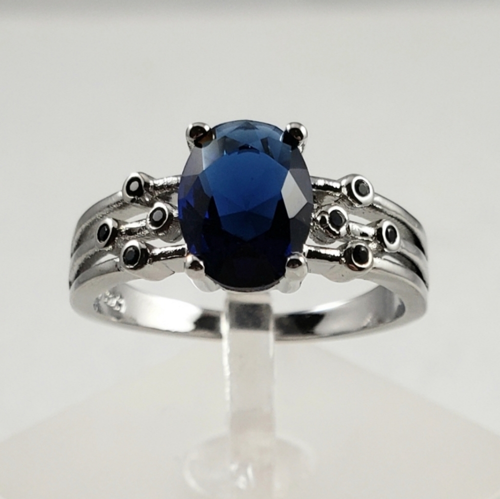Sapphire And Bezel Set Spinel Ring